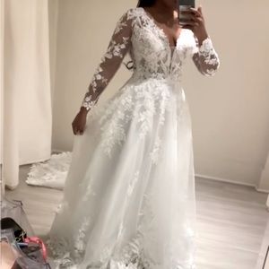 Wedding Dress original price 2500.00Asking price 1800.00